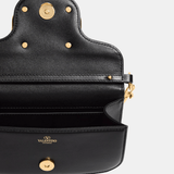 Valentino Garavani Locò Small Shoulder Bag (Black)